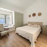 Mi Casa De *